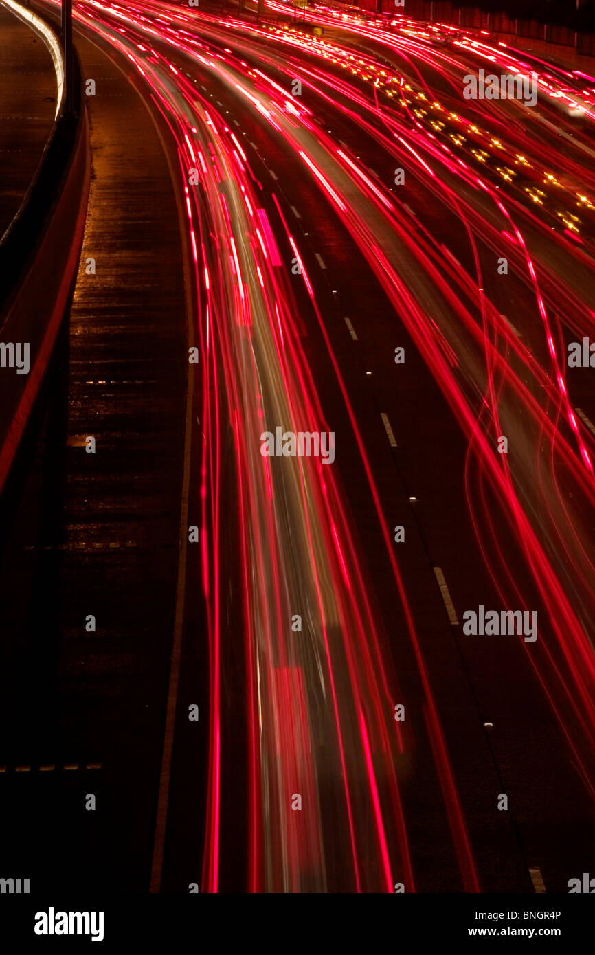 Tail lights of vehicles on the road at night, New Hampshire, USA Stock