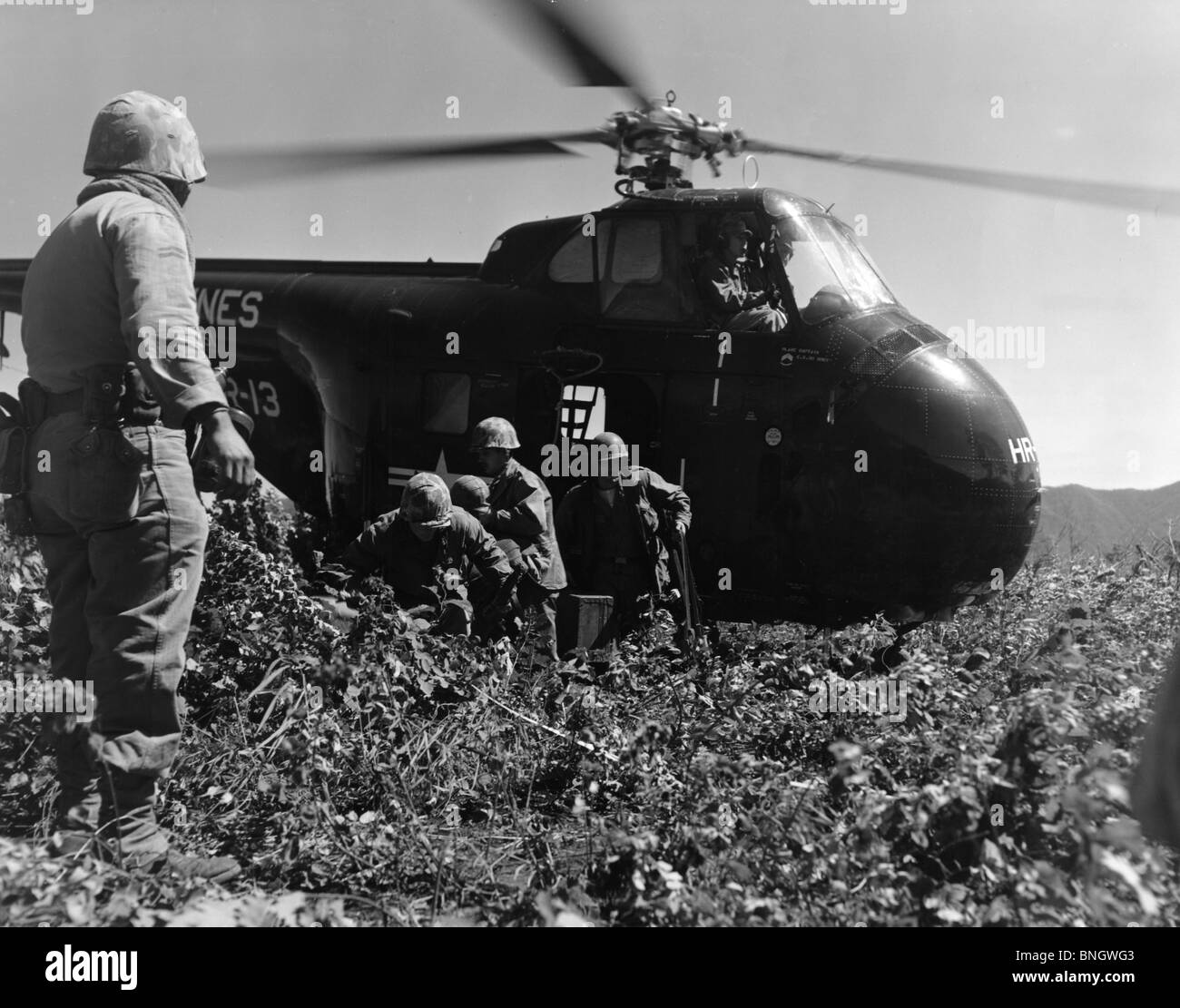 Korea, US Marine Corps, soldiers exiting military helicopter Stock Photo