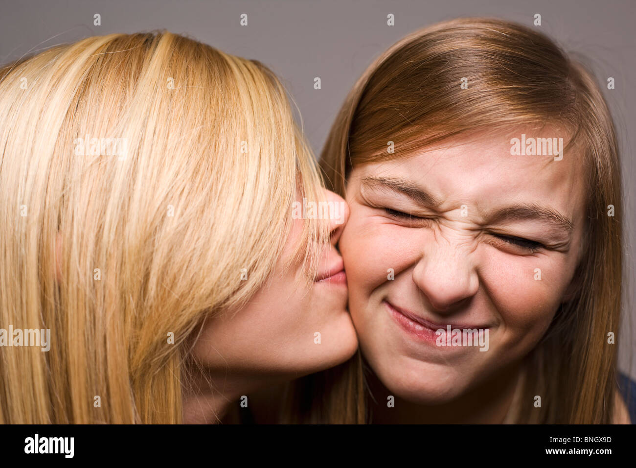 Teenage girls kissing friend hires stock photography and images Alamy