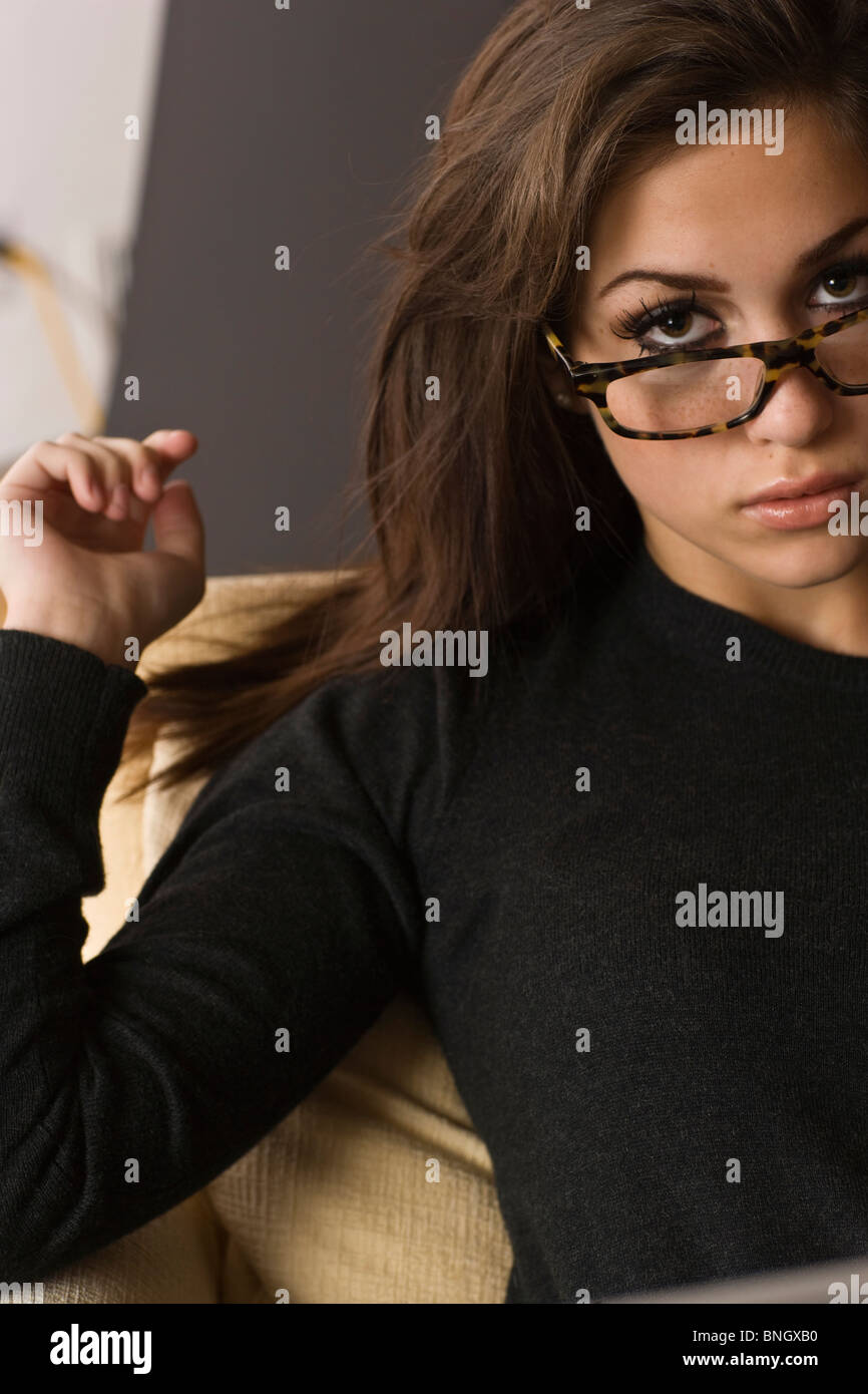 Woman with black eyeglasses hi-res stock photography and images - Alamy