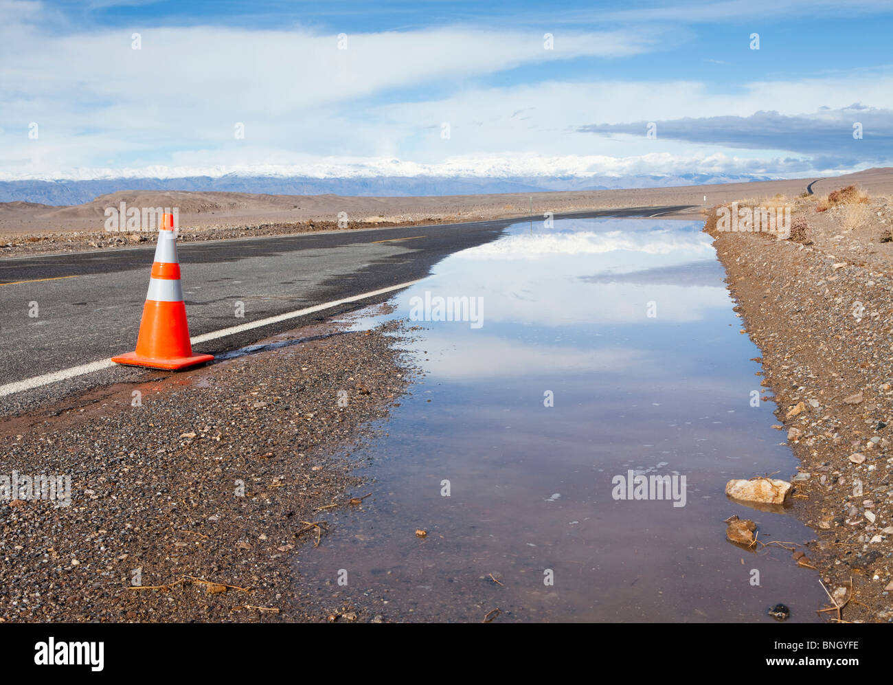 Traffic cone on a flooded road, Death Valley National Park, California