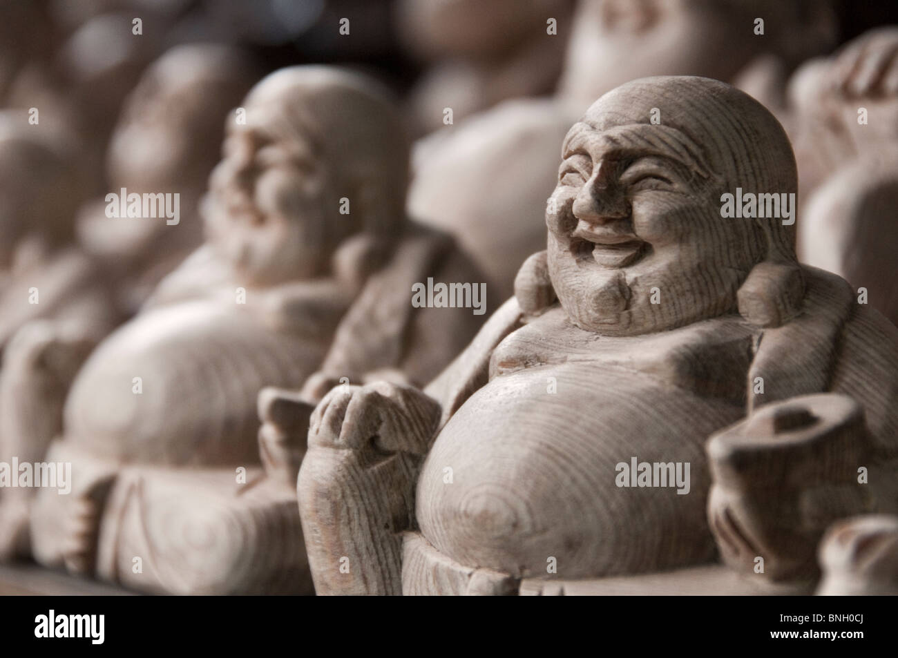 Wooden Buddha statues, Vietnam Stock Photo