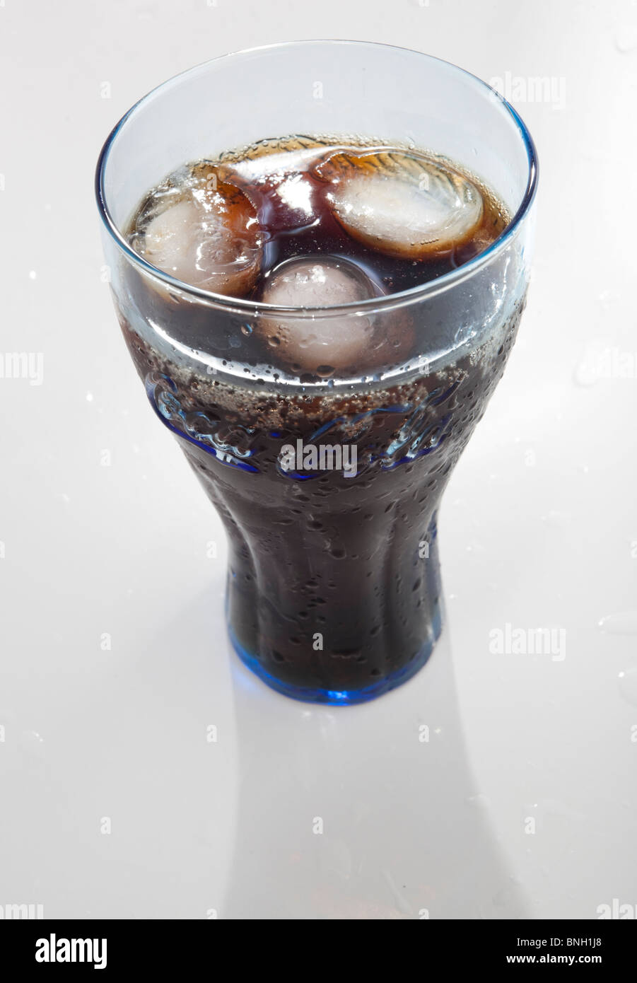 https://c8.alamy.com/comp/BNH1J8/a-glass-of-coca-cola-with-ice-cubes-cut-out-cutout-BNH1J8.jpg