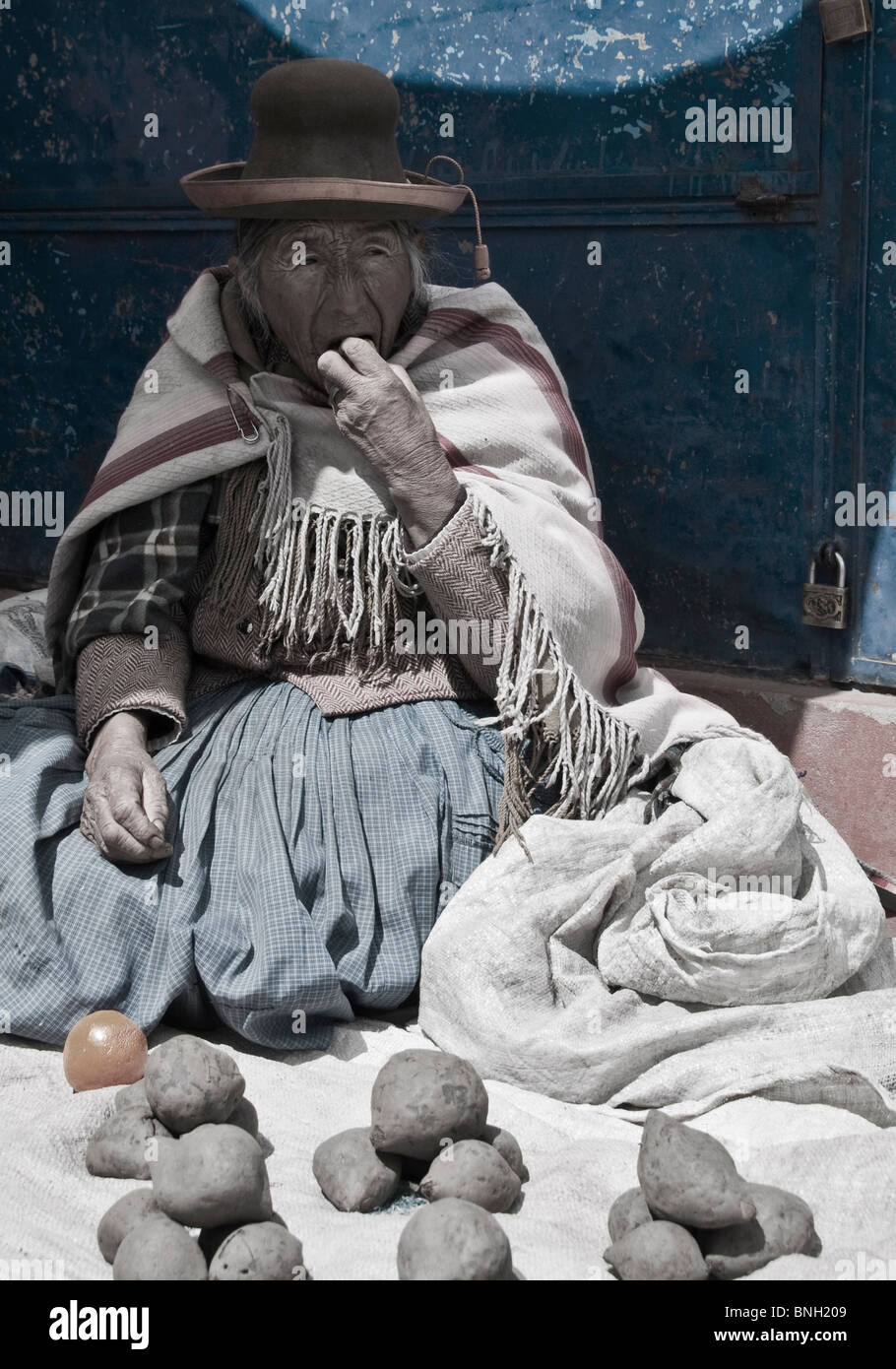 Woman Selling oranges, Lamay, Peru Stock Photo