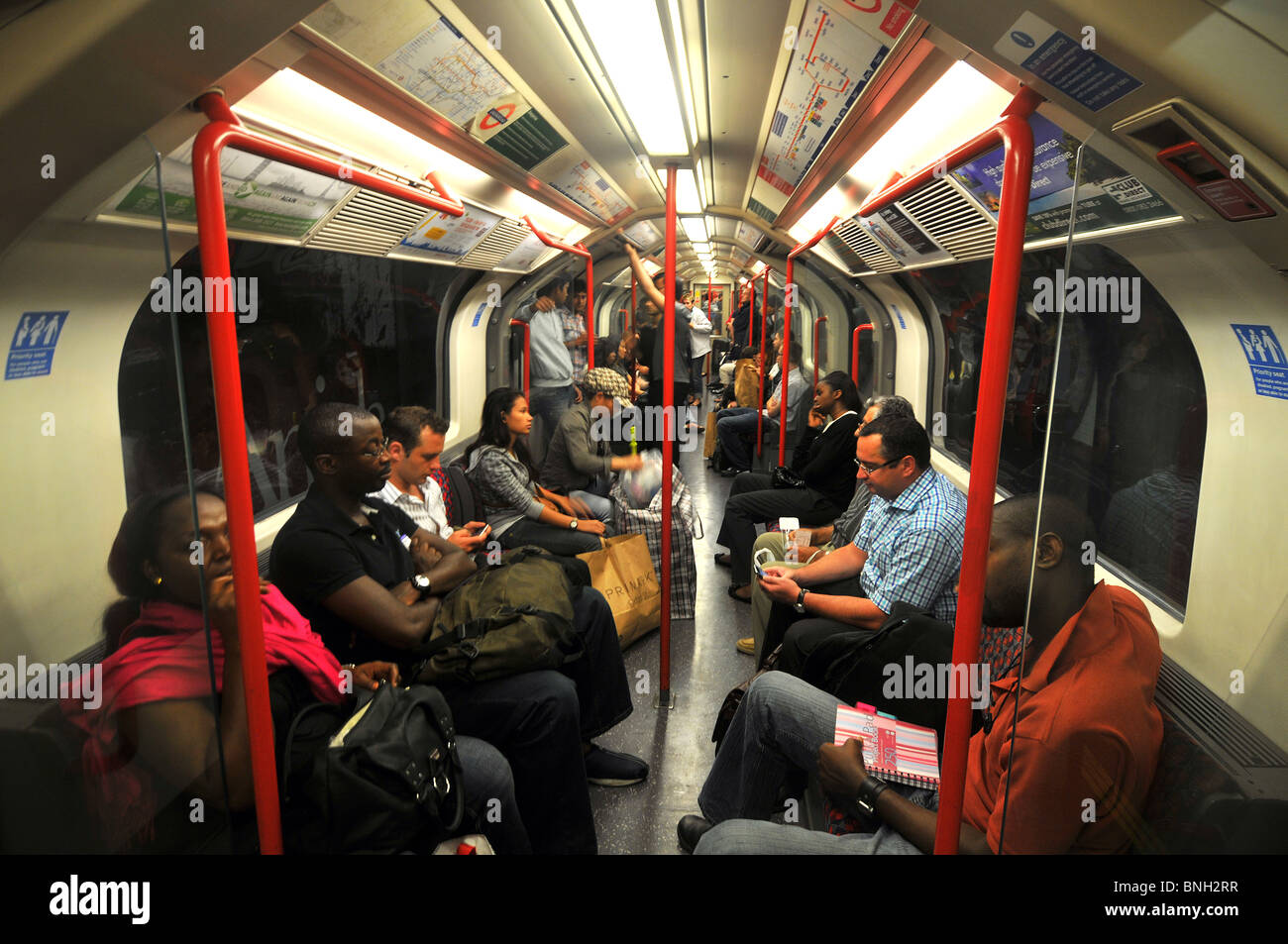 Underground tube carriage, London, passengers in underground train carriage, London, Britain, UK Stock Photo