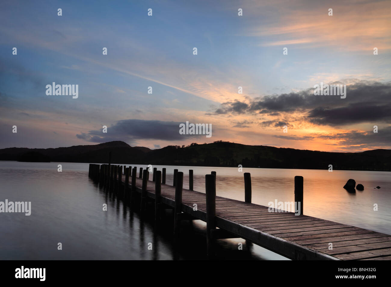 A tranquil evening as the sun sets over the Jetty on Coniston Stock