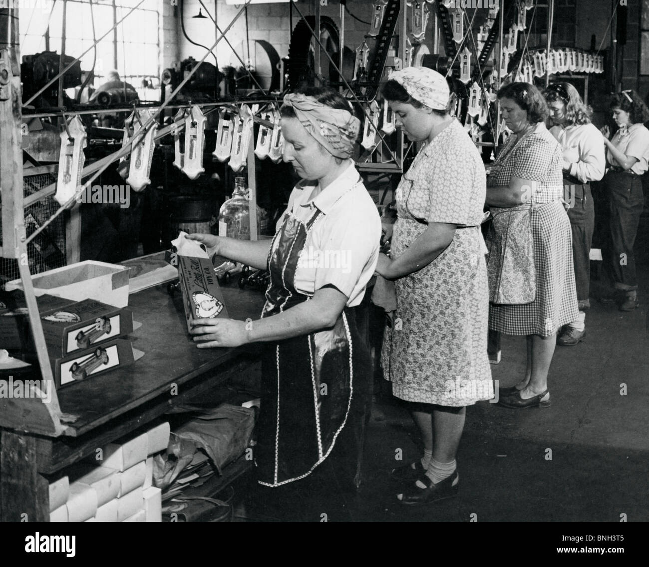 USA, Indiana, female workers working in toy car production line Stock ...