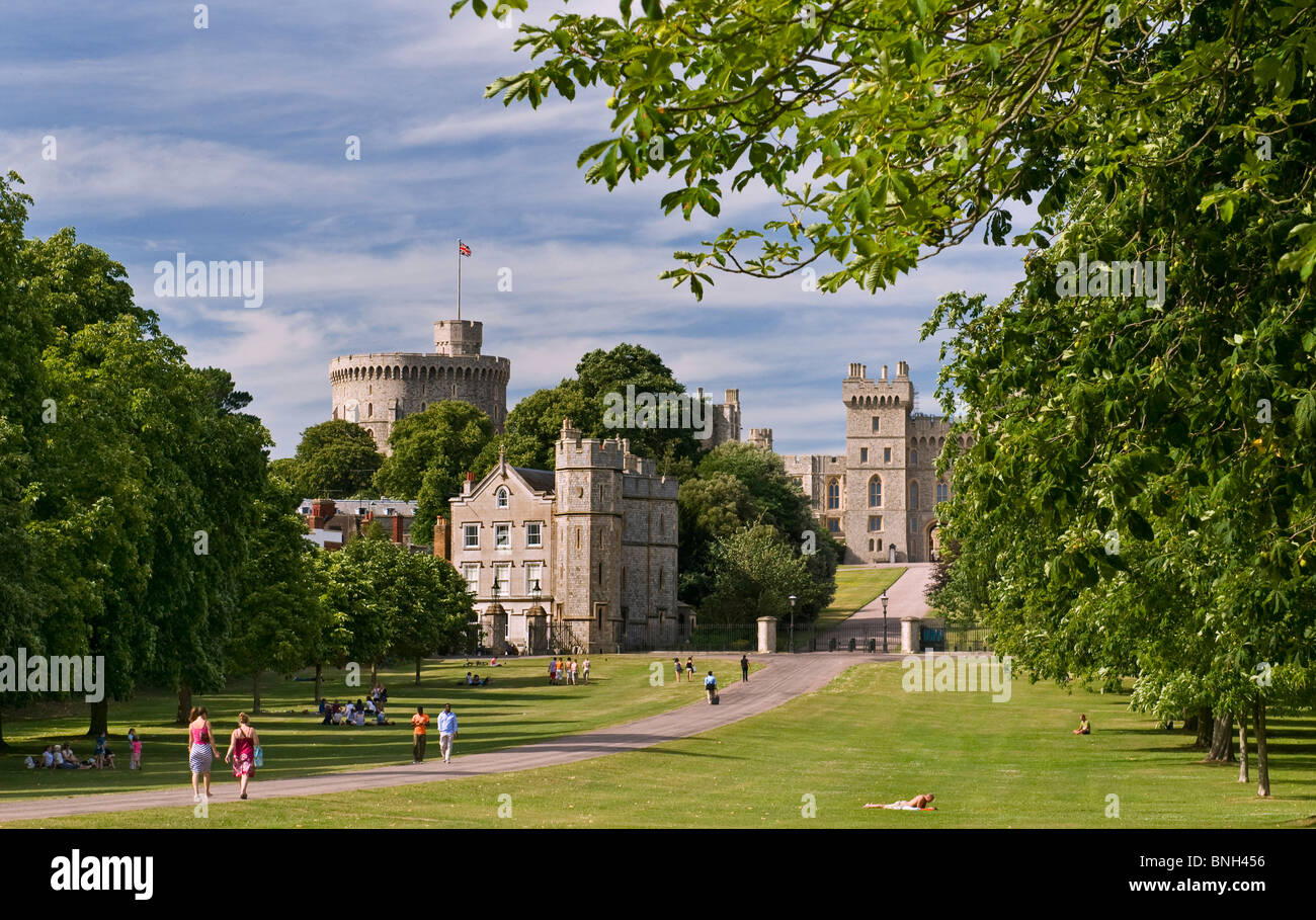 Windsor Castle viewed down the Long Walk with people enjoying the summer sun  Windsor Berkshire UK Stock Photo