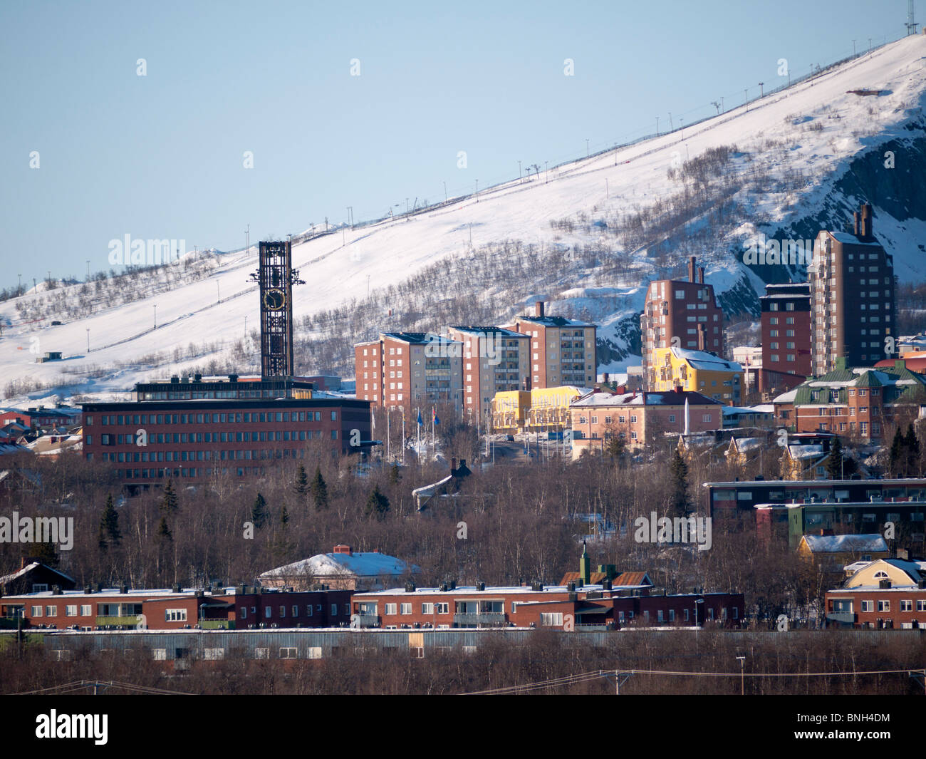 View on the town of Kiruna, Lapland, Sweden, with the townhall on the right, and the Luossavaara mountain in the background. Stock Photo