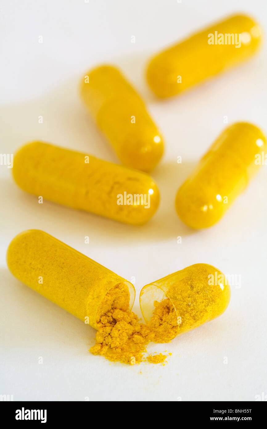 Close up of turmeric capsules with open capsule Stock Photo Alamy