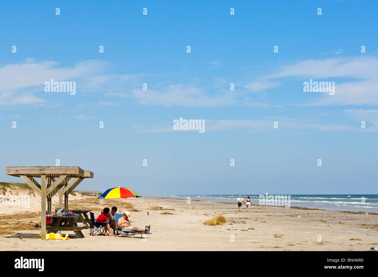 Texas, Padre Island. Beach goers at Padre Island National Seashore. Stock Photo