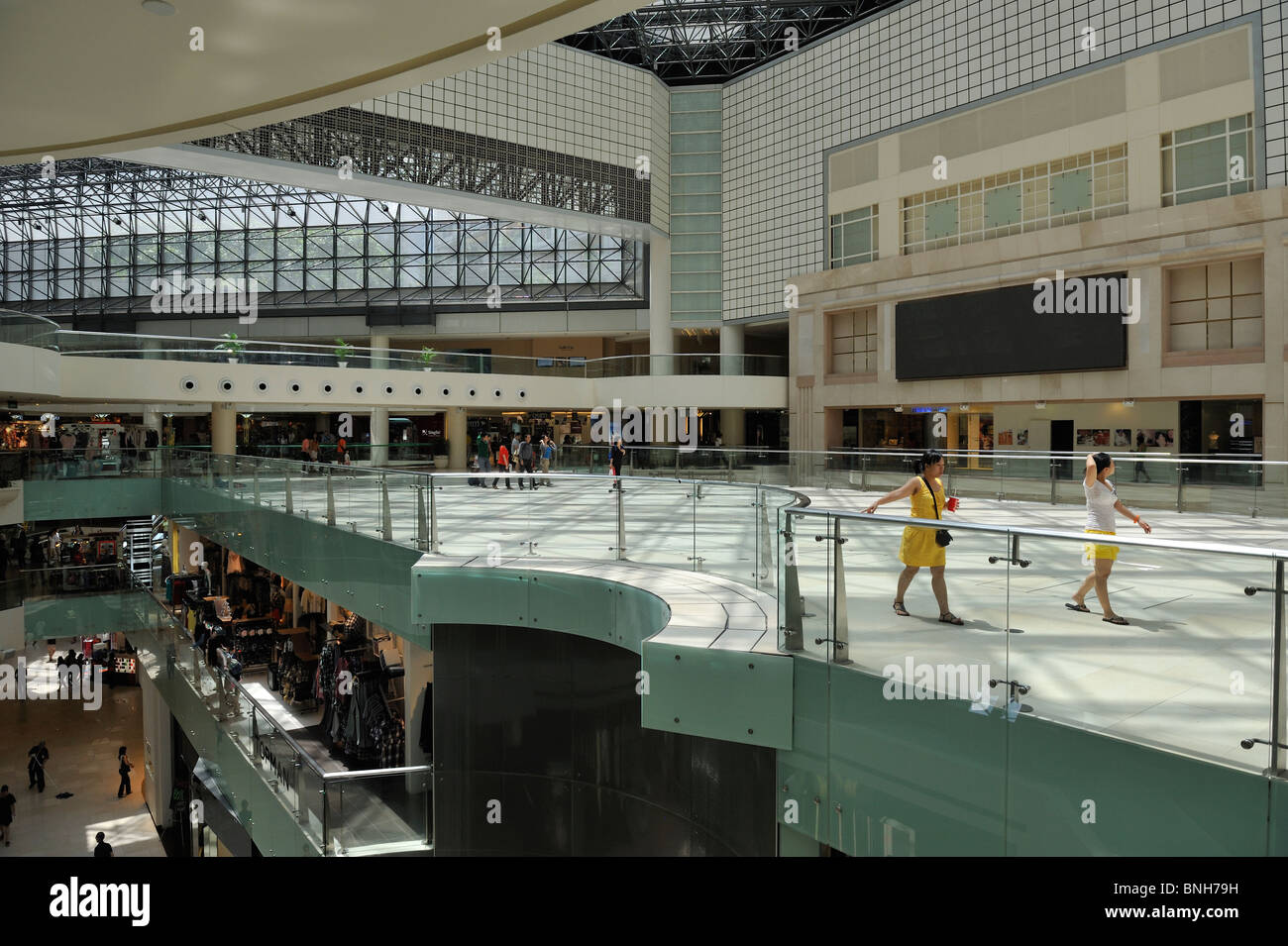 Raffles City shopping mall has been developed to house multi storey shops in what previously was the atrium Stock Photo
