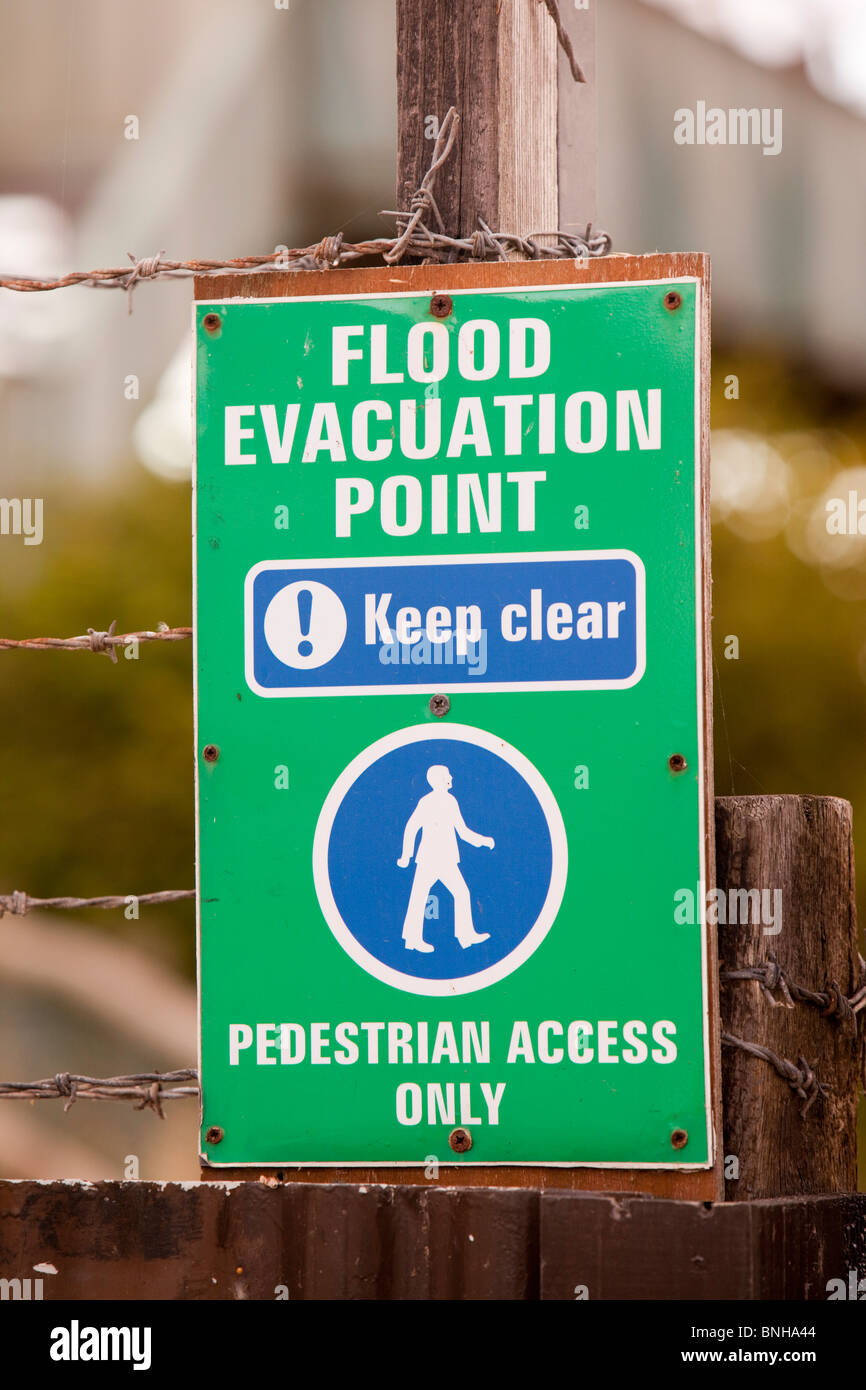 A flood evacuation sign at a caravan park in Towyn, North Wales, that is susceptible to coastal flooding. Stock Photo