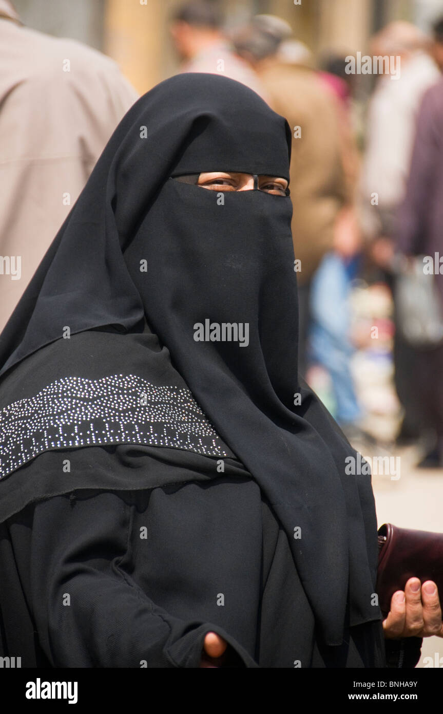 woman in a burkha in Cairo Egypt Stock Photo