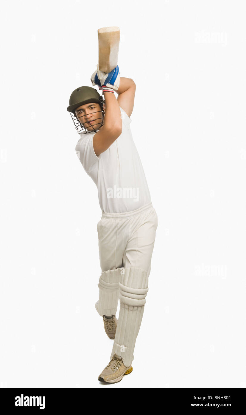 Cricket batsman playing a straight drive Stock Photo Alamy
