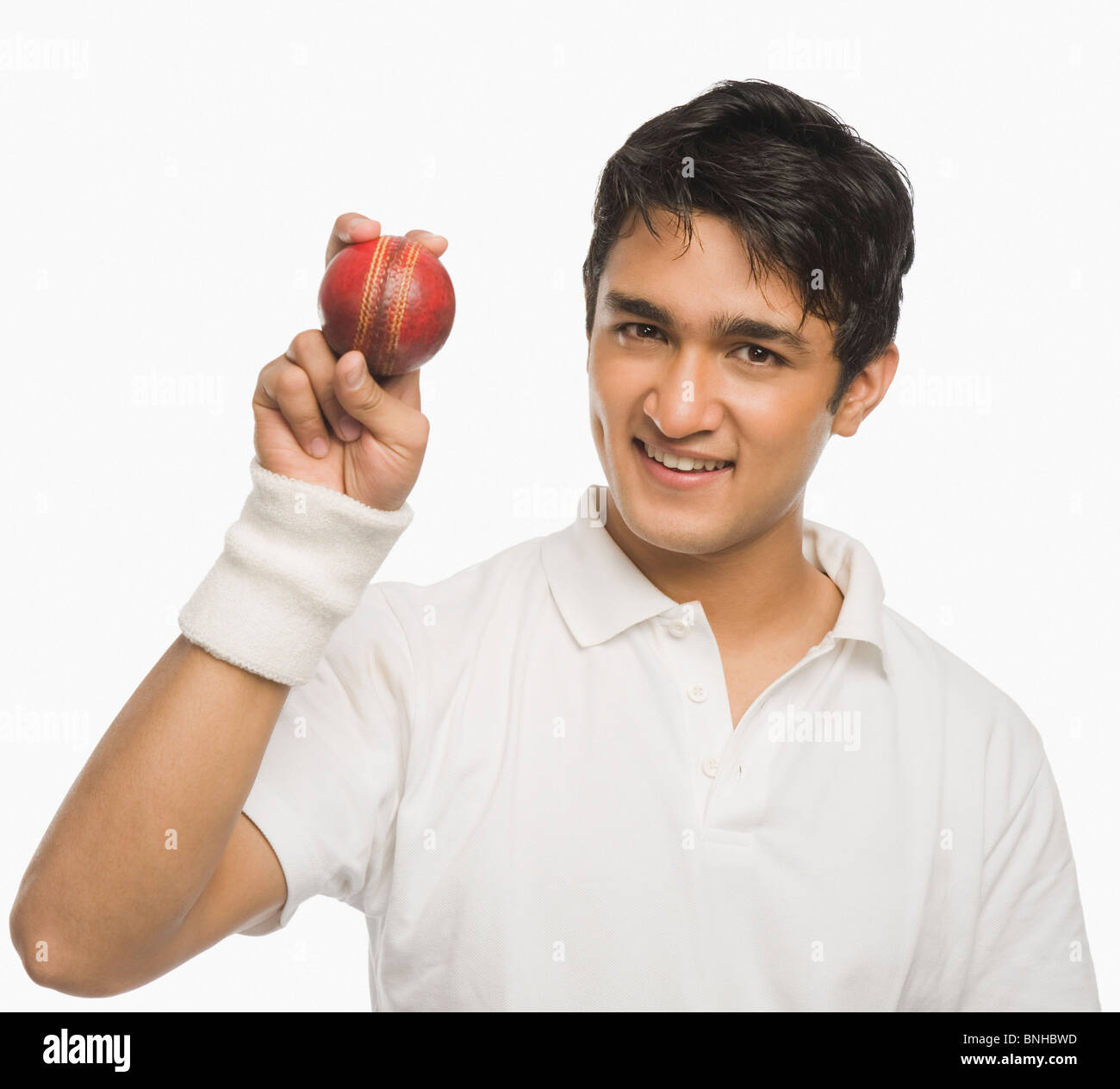 Cricket player showing a cricket ball Stock Photo Alamy