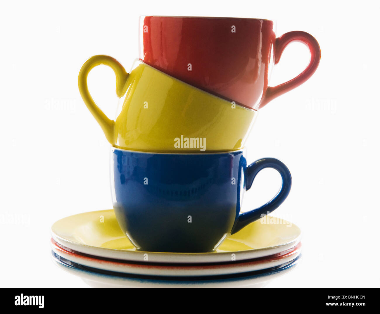 Stack of tea cups and saucers Stock Photo Alamy