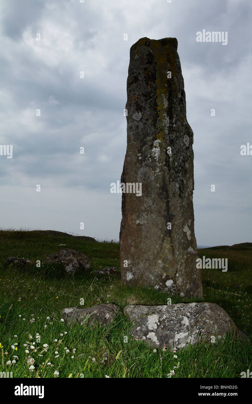A Standing stone on the Isle of Mull near Dun Ara, moodily lit. Stock Photo