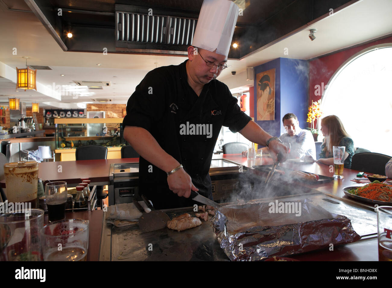 Cooking on the hotplate grill at Koi in Edinburgh Stock Photo