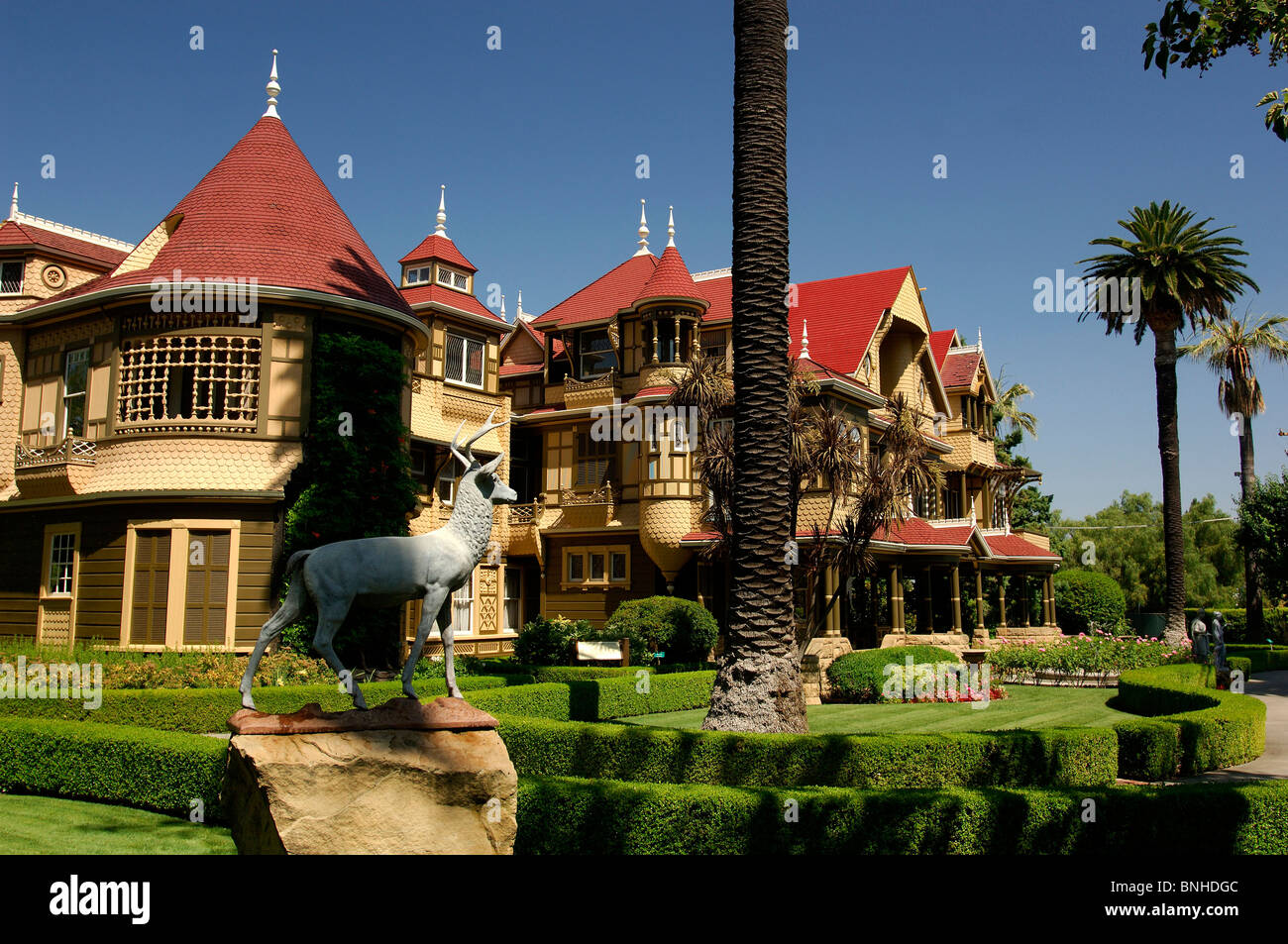 Usa San Jose California Winchester Mystery House Mansion Villa Palm Trees Deer Sculpture Garden Park United States of America Stock Photo