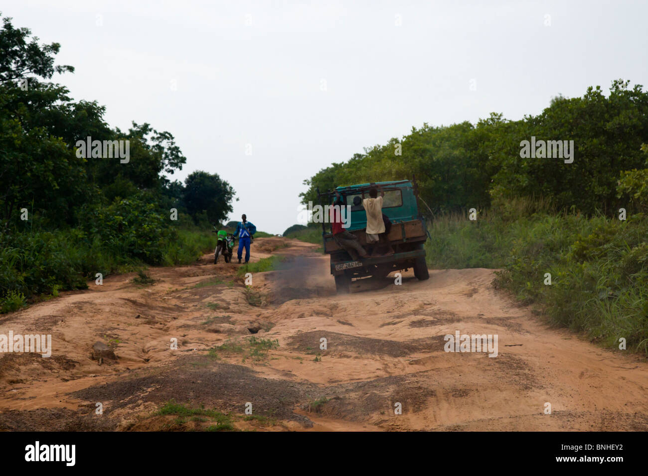 Truck negotiating a rural dirt road in the Gonja Triangle, Damango district, of Northwest Ghana. Stock Photo