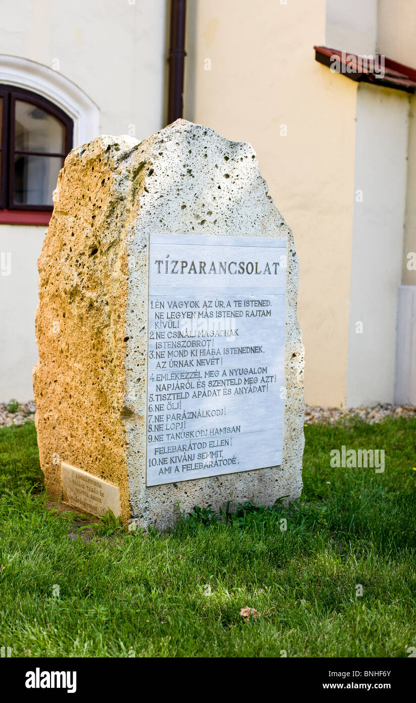 The Ten Commandments in hungarian displayed in front of the Reformed Church in Hajduszoboszlo Hungary Stock Photo