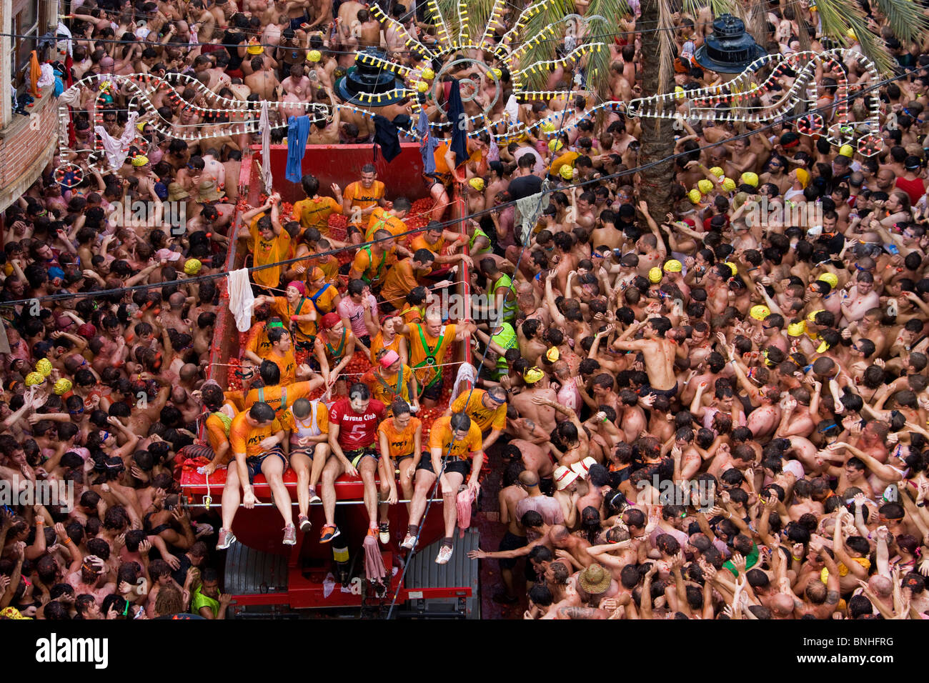 Spain August 2008 Valencia Region Bunol city Tomatina Festival Tomato tomatoes food fight crowds crowd people tourism event fun Stock Photo