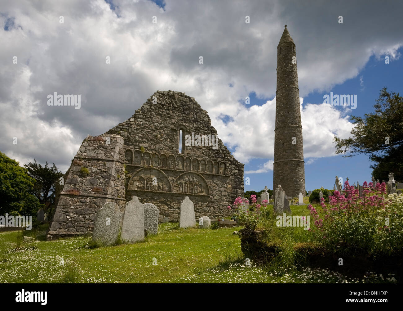 13th Century St Declan's Cathedral and Round Tower, Ardmore, County Waterford, Ireland Stock Photo