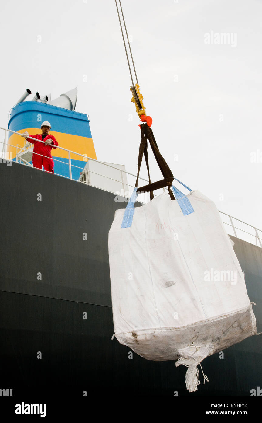 Supplies being hoisted onboard a supertanker moored at sea. Stock Photo