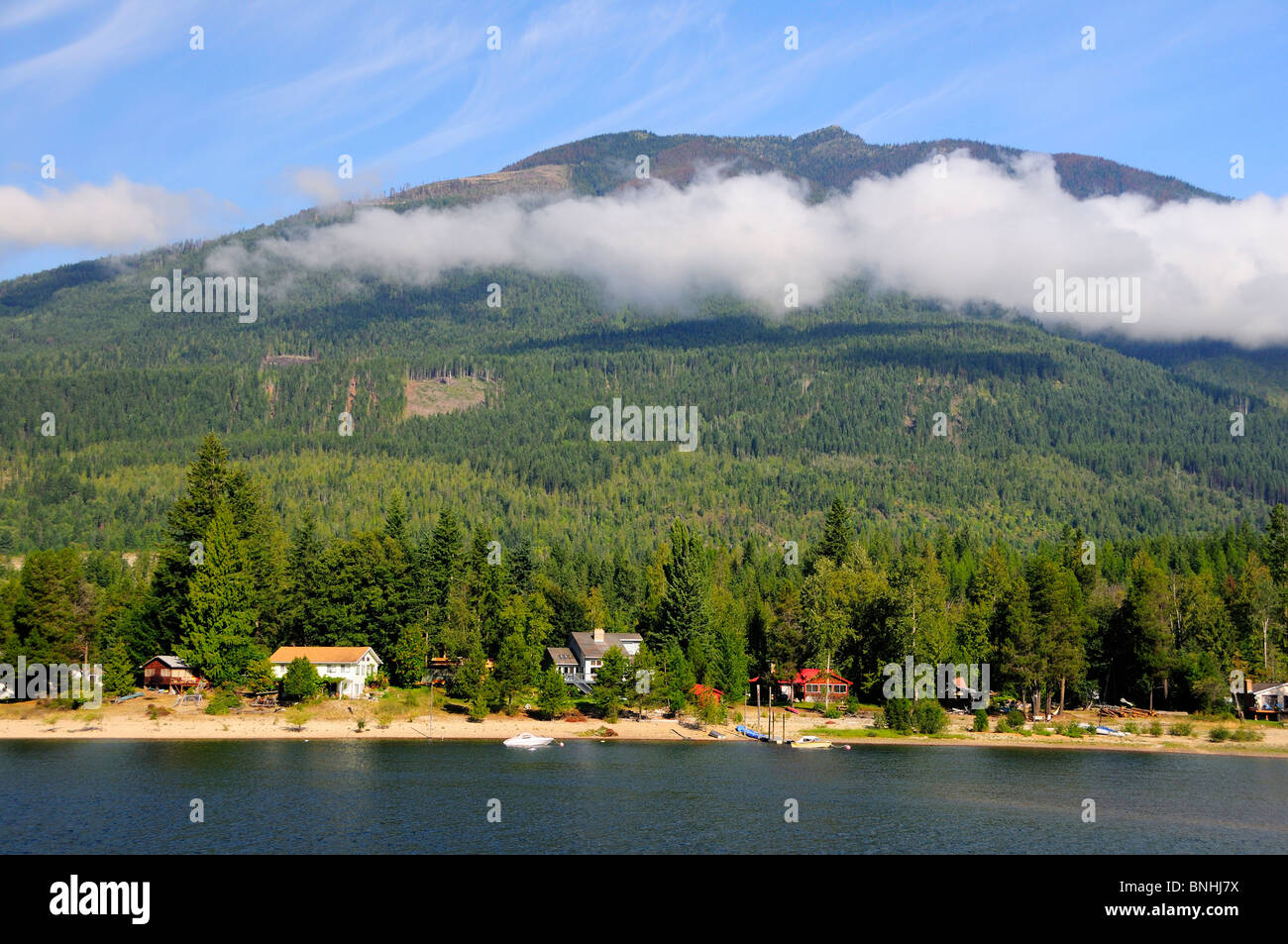 Canada Houses at Kootenay Lake Balfour British Columbia Rocky mountains Rockies nature landscape scenery forest coniferous Stock Photo