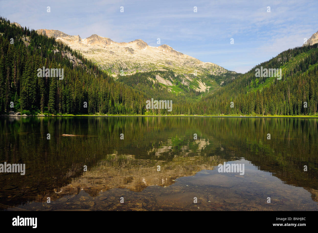 Canada Gibson Lake Kokanee Glacier Provincial Park Nelson British Columbia Rocky mountains Rockies water reflection nature Stock Photo