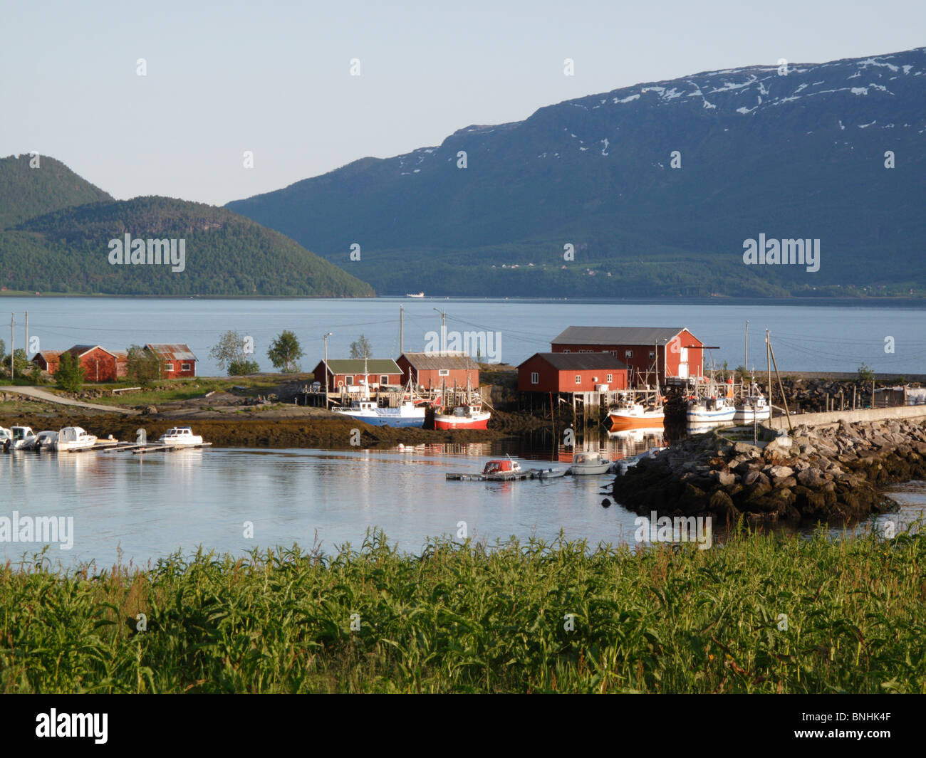 Styrkesnes harbour in Norway, Norland Fylke, in summer. This is late in the evening, but bright because of midnight sun Stock Photo