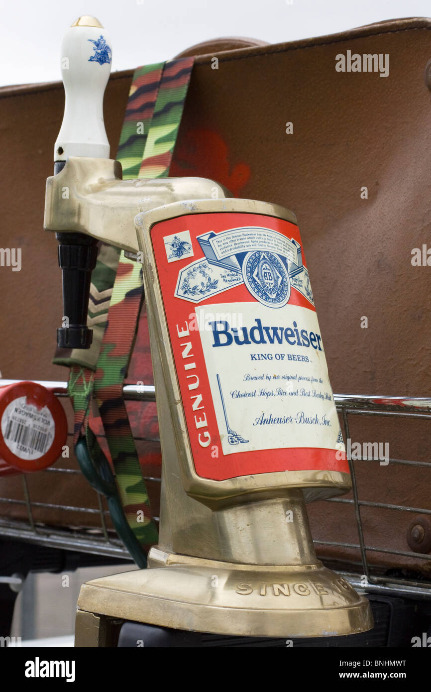 An old Budweiser Pump on the roof rack of a Rat Car Stock Photo