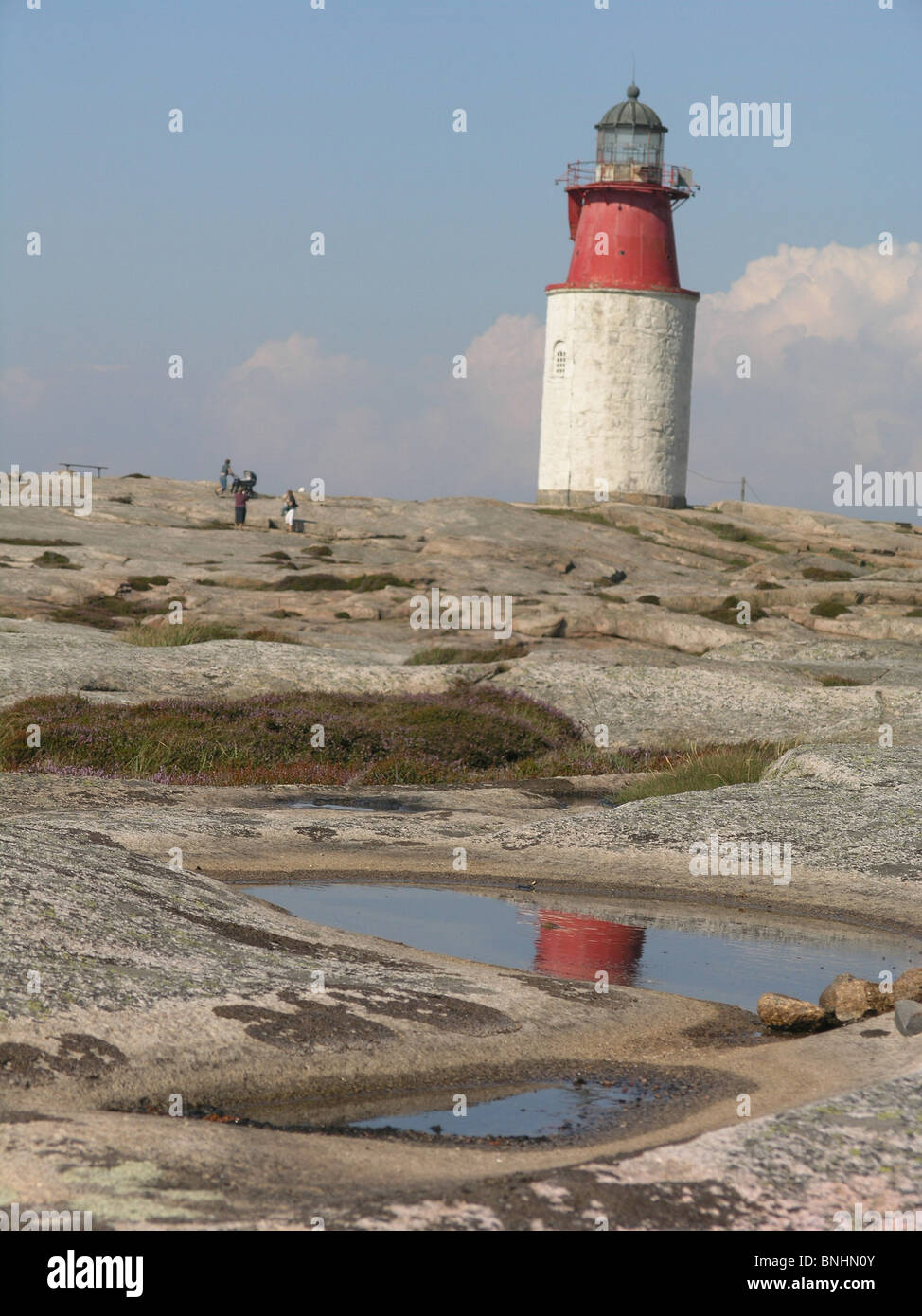 Sweden Hallö Bohuslän province lighthouse rock archipelago coast sea ocean landscape people Scandinavia Stock Photo