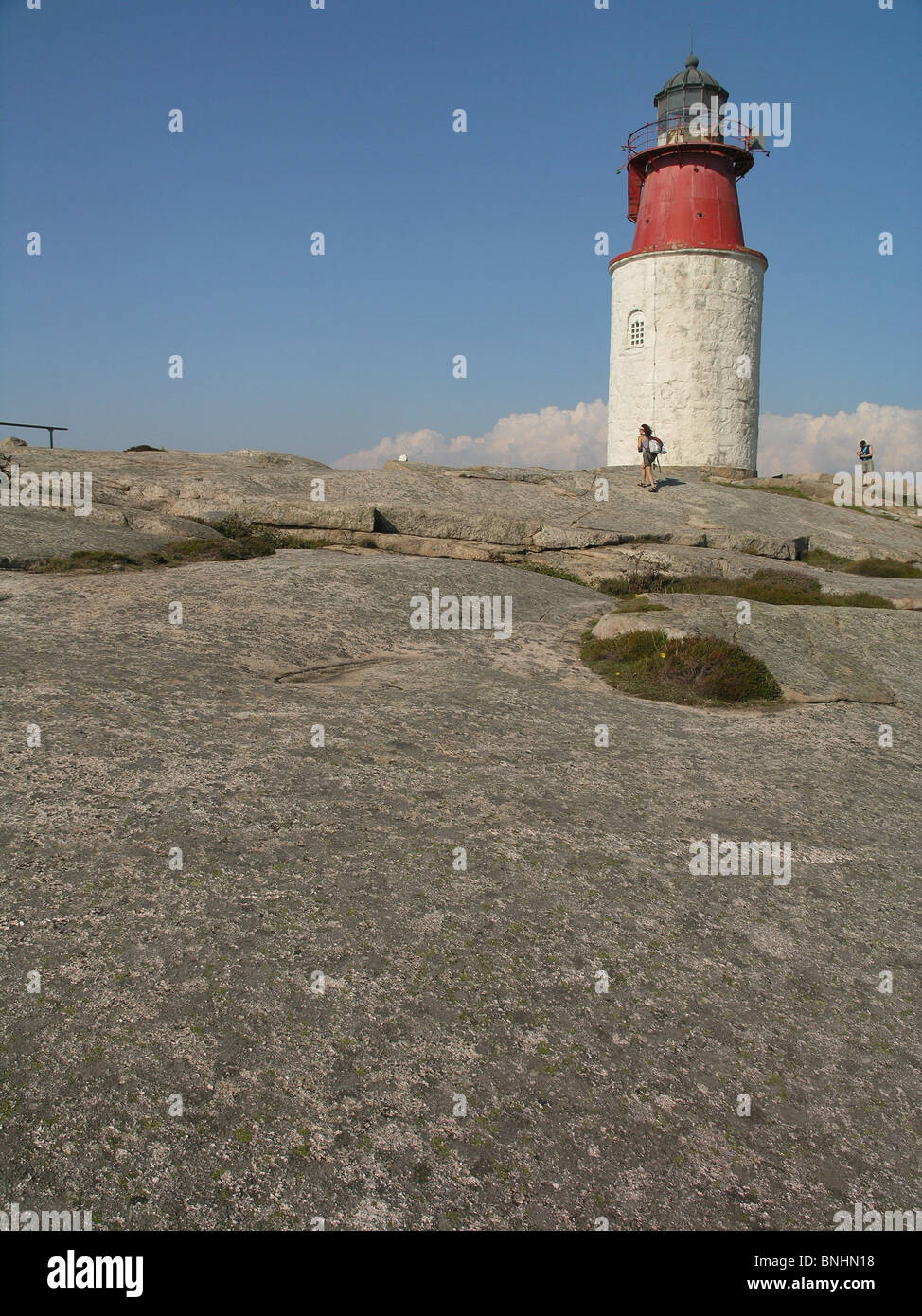 Sweden Hallö Bohuslän province lighthouse rock archipelago coast sea ocean landscape people Scandinavia Stock Photo