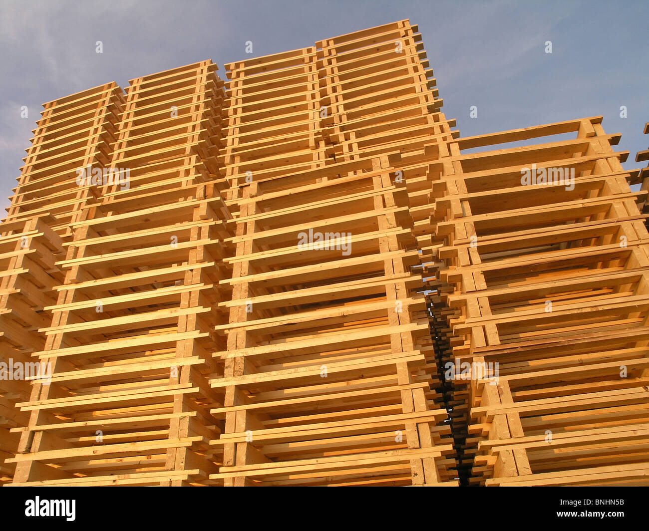 Sweden pallet pallets wooden wood stacked outside outdoors stack high ...