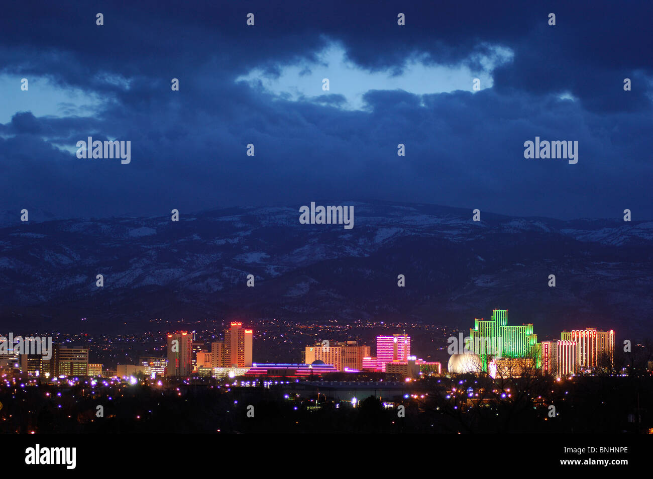 USA Las Vegas Nevada night lights city illuminated illumination mountains clouds landscape scenery Stock Photo