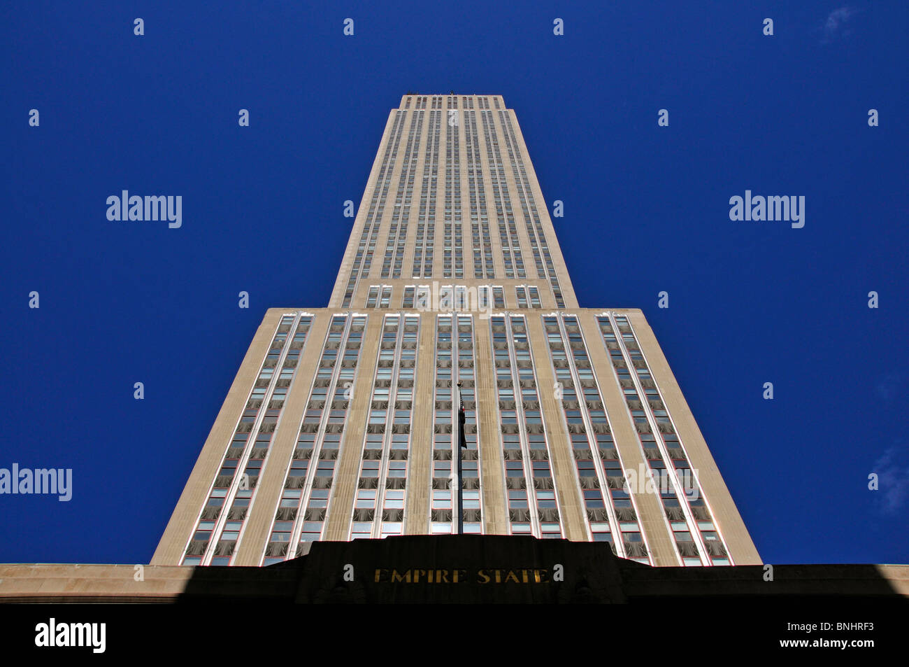 Empire State Building Manhattan New York City USA High-rise building New York Skyscraper Blue sky Facade Stock Photo