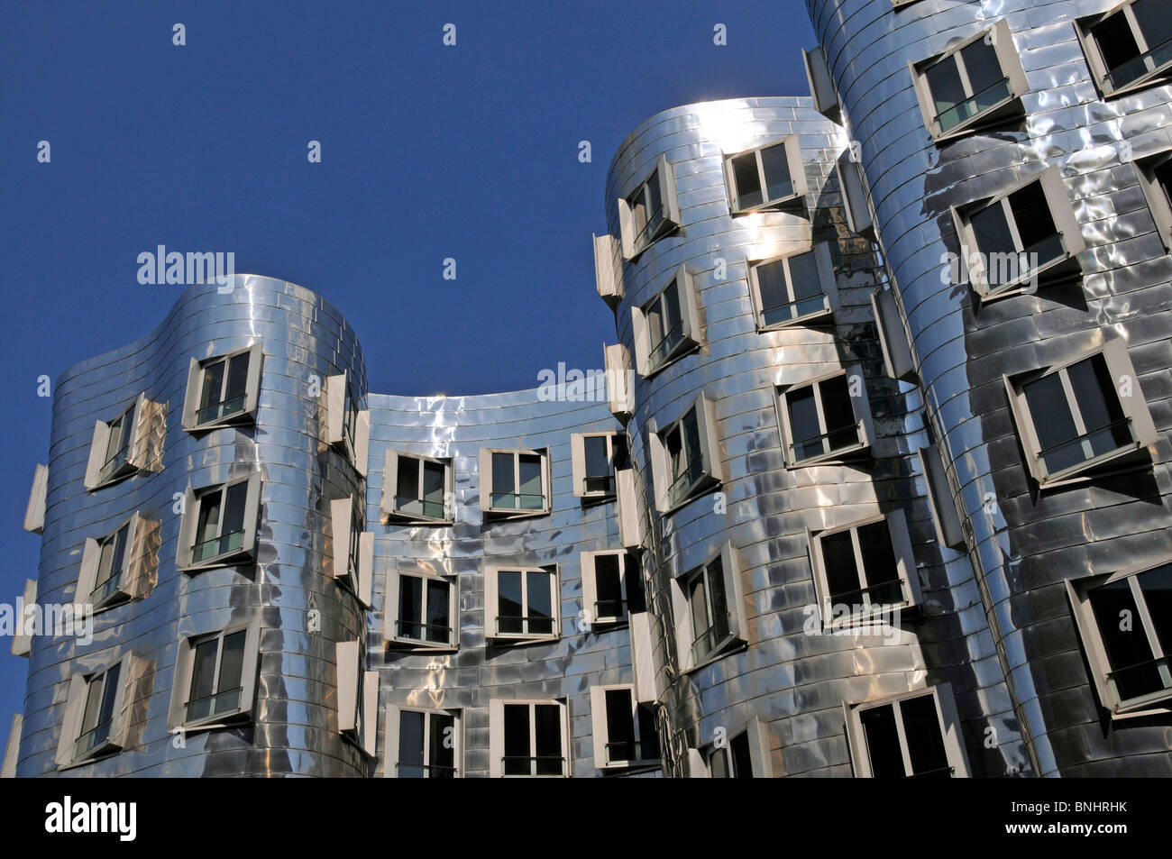 Gehry buildings Düsseldorf city North Rhine-Westphalia Germany Europe Medienhafen Zollhof Frank Gehry Architecture modern Stock Photo