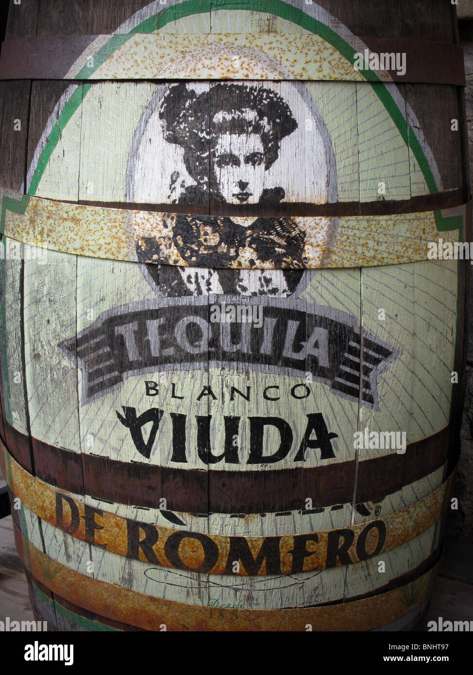 Wooden Barrel Painted With The Brand Of Viuda Tequila Stock Photo