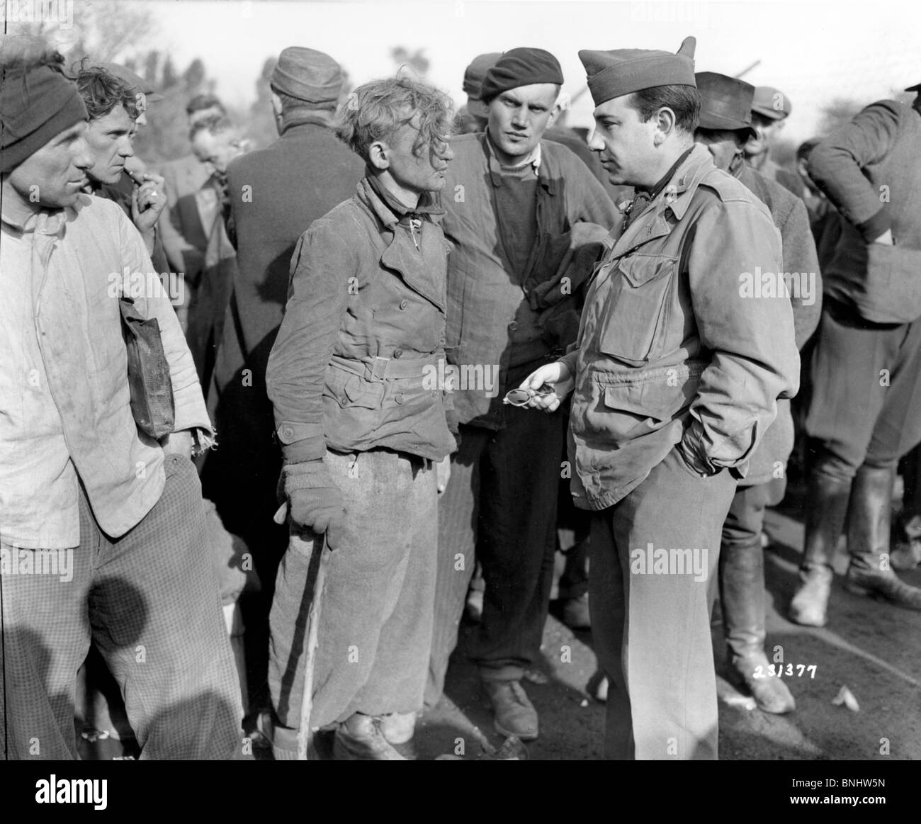 World War II slave talking labor camp Germany April 1945 history historical historic prisoners prisoner Nazi German Second Stock Photo