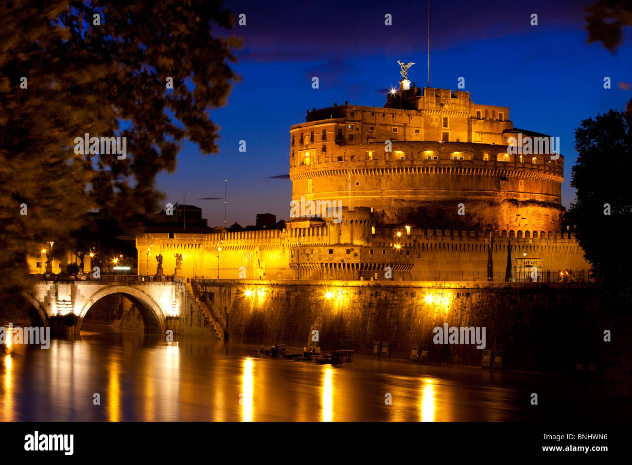 Castel Sant Angelo across the River Tiber at dusk, Rome Lazio Italy Stock Photo