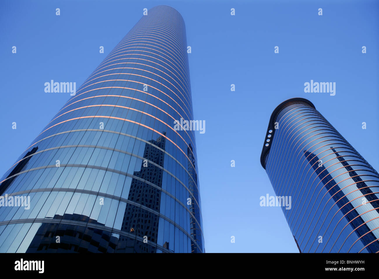 Blue mirror glass facade skyscraper buildings city of Houston Texas