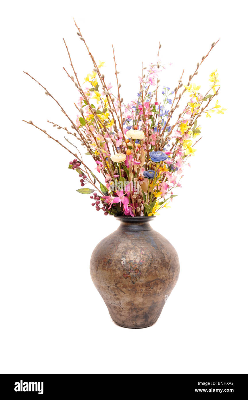 Huge vase with fake flowers isolated on white Stock Photo Alamy