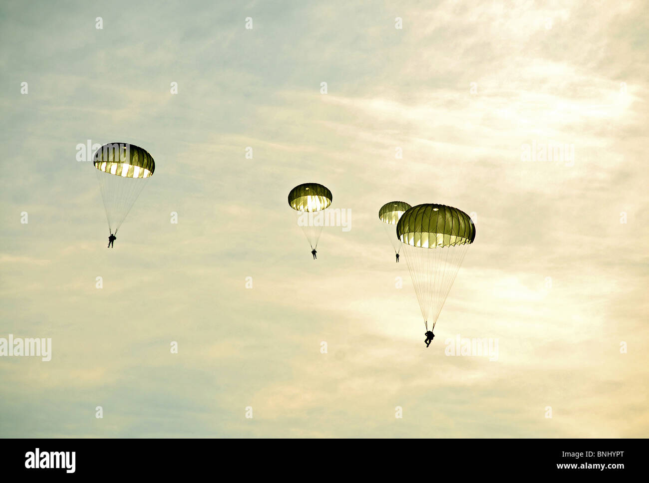 Airshow aerial acrobatics parachutist parachute parachuting sky Stock Photo