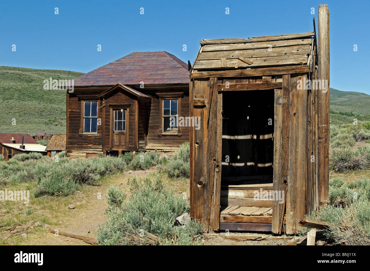 An outhouse in Bodie State Park, California. Summer morning Stock Photo