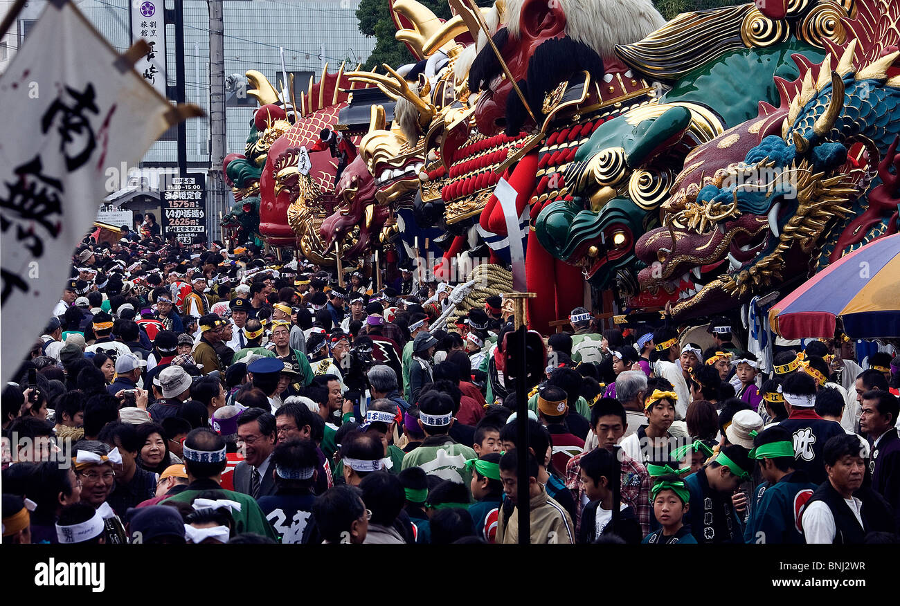 Japan Asia Kyushu island isle Karatsu city Okunichi festival tradition dragon kite crowd of people Stock Photo