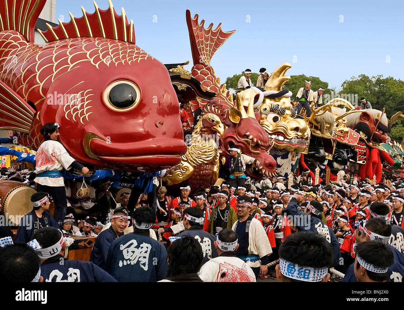 Japan Asia Kyushu island isle Karatsu city Okunichi festival tradition dragon kite crowd of people Stock Photo