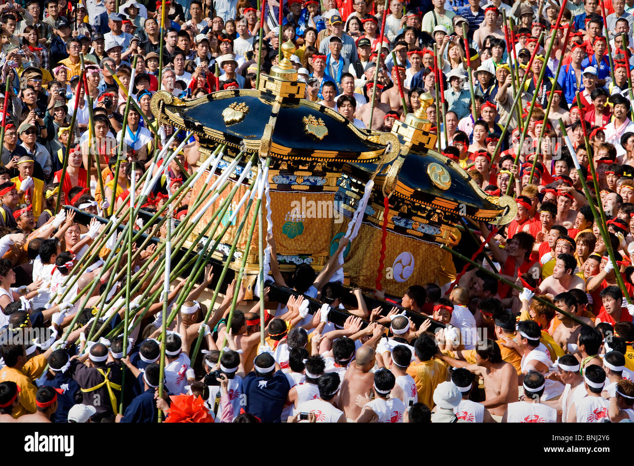 Japan Asia Kyushu island isle Karatsu city Okunichi festival tradition dragon kite crowd of people relocation move, Stock Photo