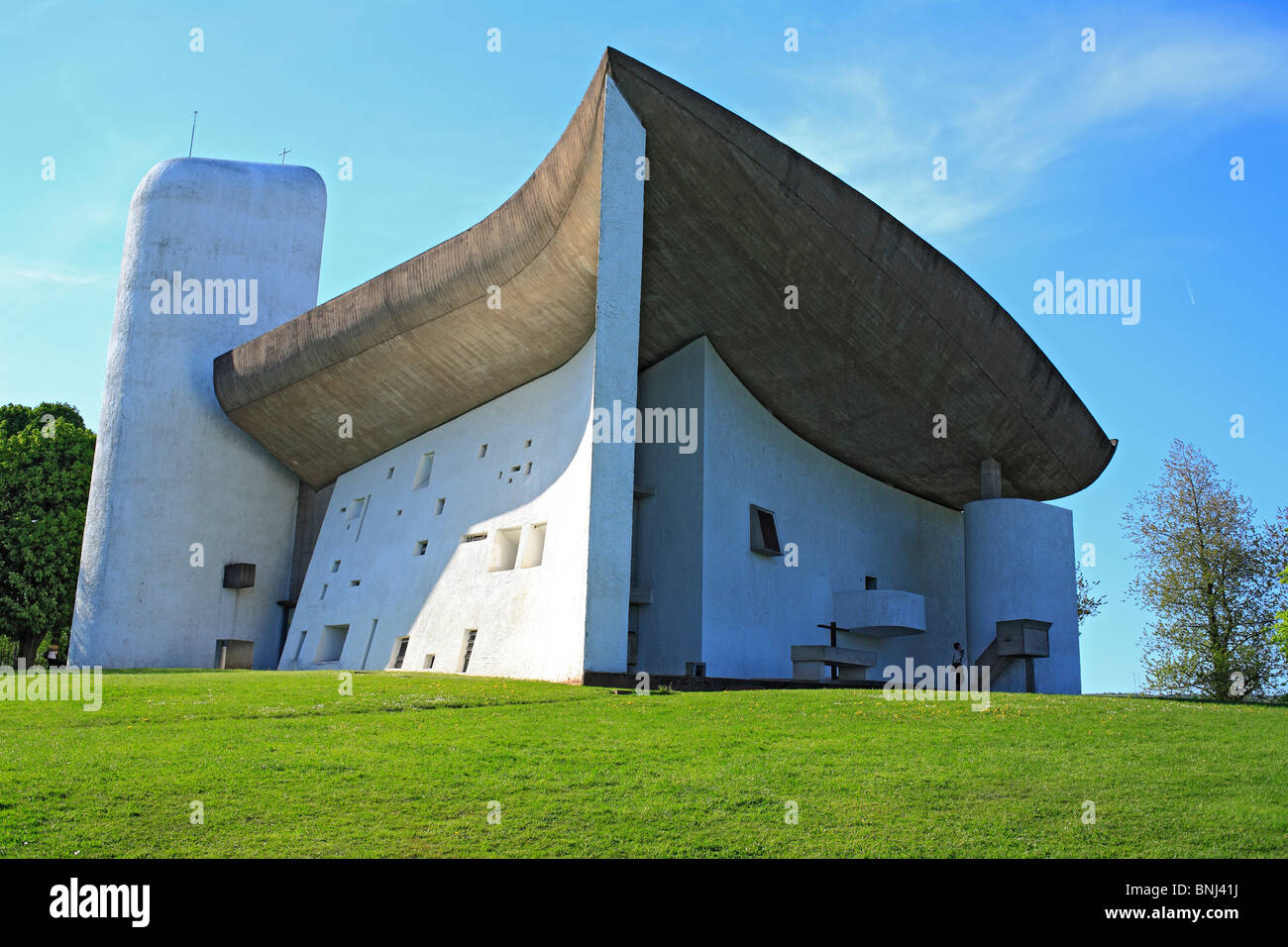 Western Europe Europe European tourism travel Daytime France French blue sky Christian Christianity Church Green grass Chapel Stock Photo
